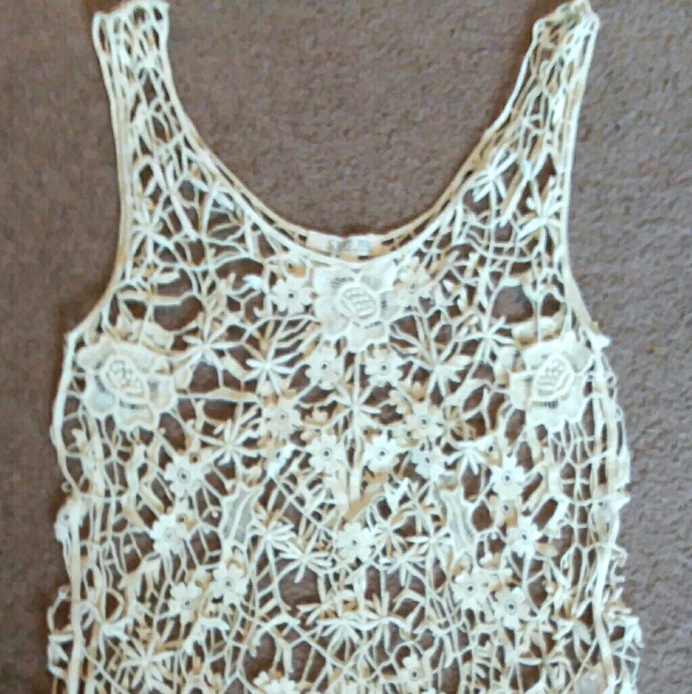 A crotched, floral see through Top